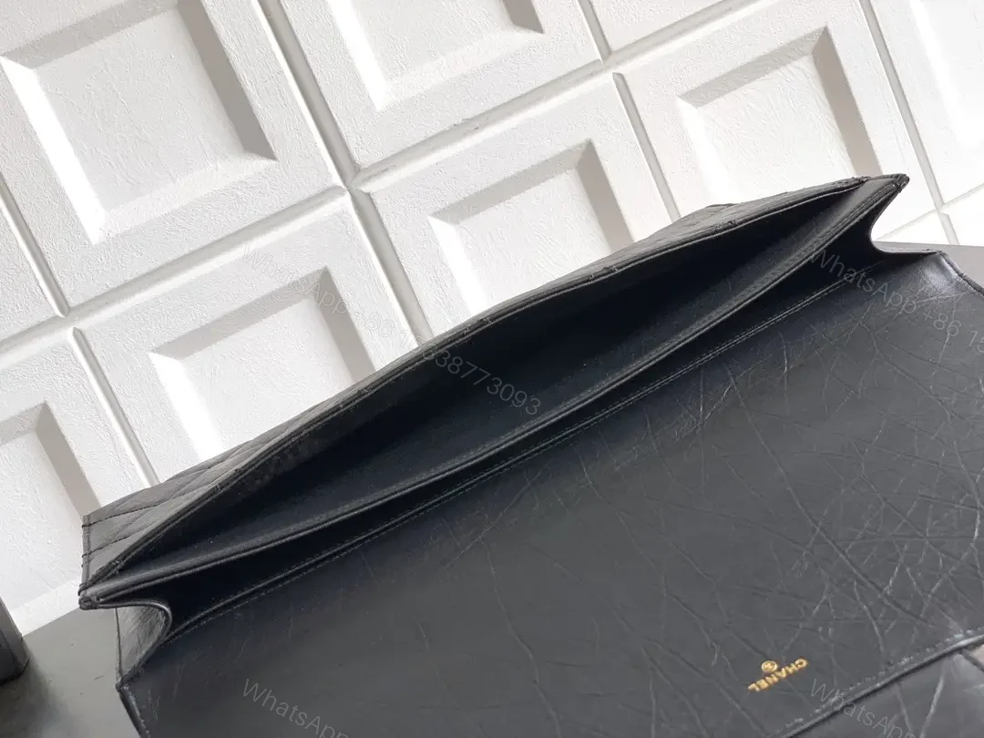 View 4 of Compact Quilted Leather Wallet with Gold Logo