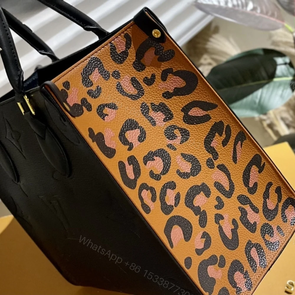 View 4 of Louis Vuitton Onthego MM Wild at Heart Black 35Cm M58522