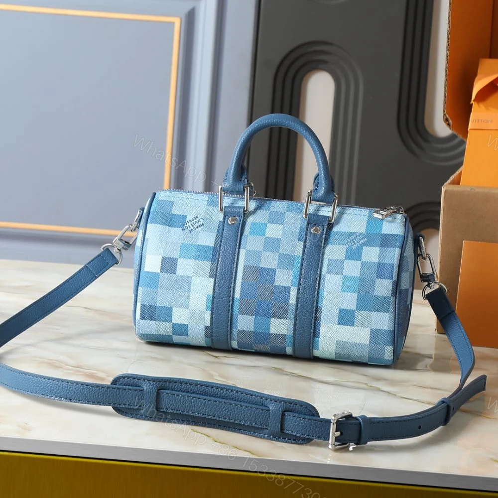 View 4 of Louis Vuitton Keepall Bandoulière 25 Blue 25Cm M28600