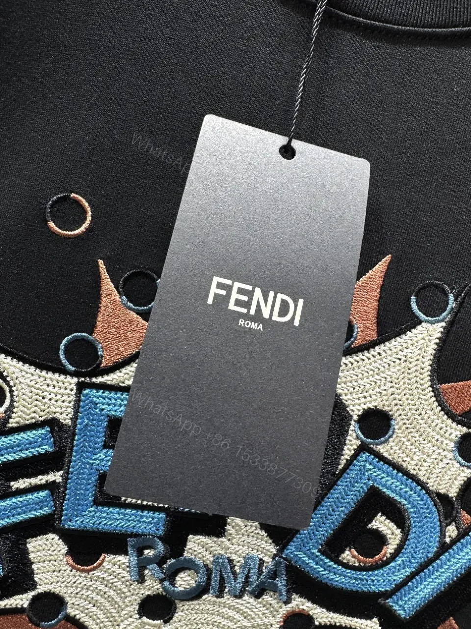 View 7 of Black Cotton Tee | Textured Graphic Streetwear Style + Bold Logo Detail