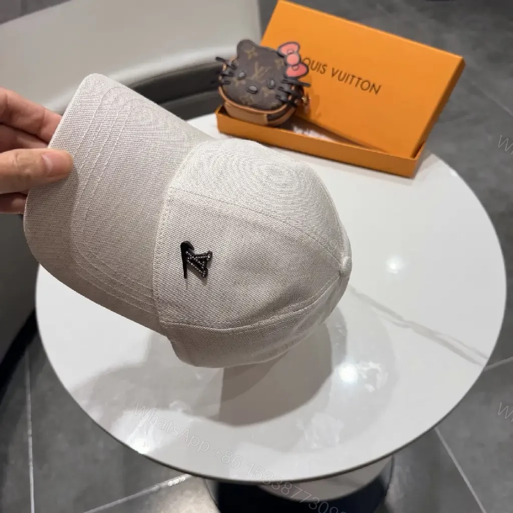 View 7 of Cozy Chic Cap: Subtle LV Logo, All-Season Cotton blend Cap