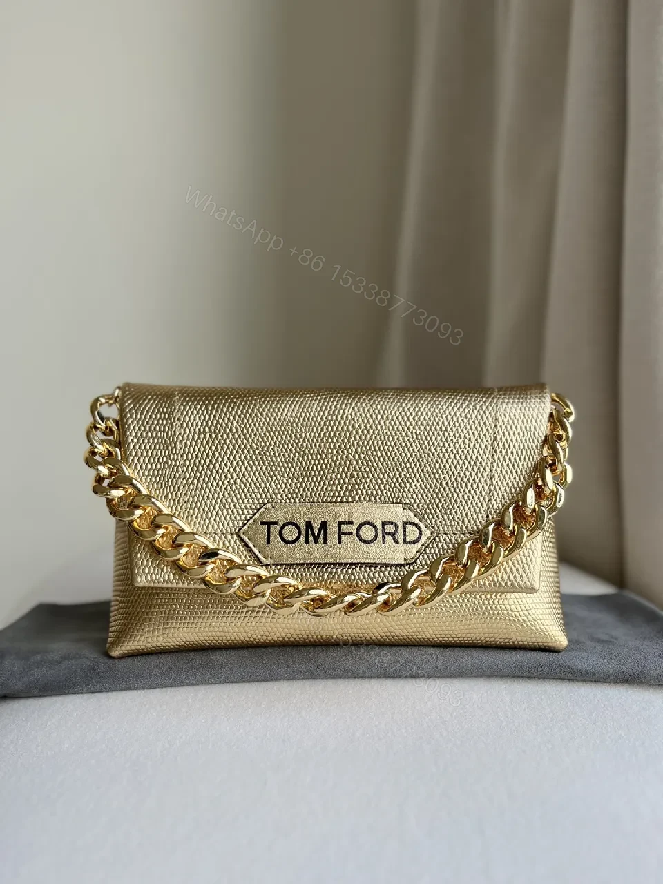 View 2 of Textured Leather Mini Bag with Bold Gold Chain Accent