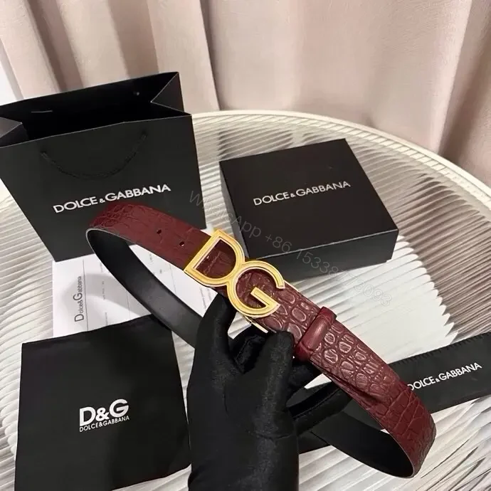 View 2 of Burgundy Crocodile-Texture Belt with Gold DG Buckle