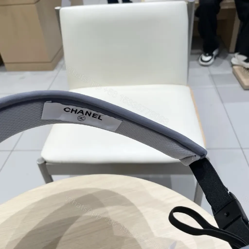 View 5 of Minimalist Black Visor with Chanel-Inspired Detail, UV Shield