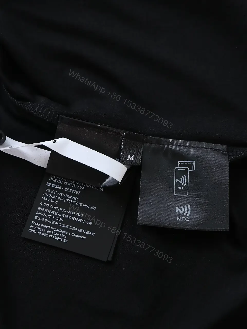 View 2 of Minimalist Black Cotton Tee: Logo-Embossed Luxury Top
