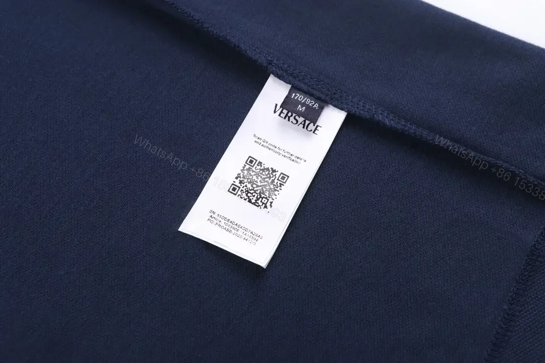 View 7 of Minimalist Navy Knit Polo: Subtle Crest Luxury Polo