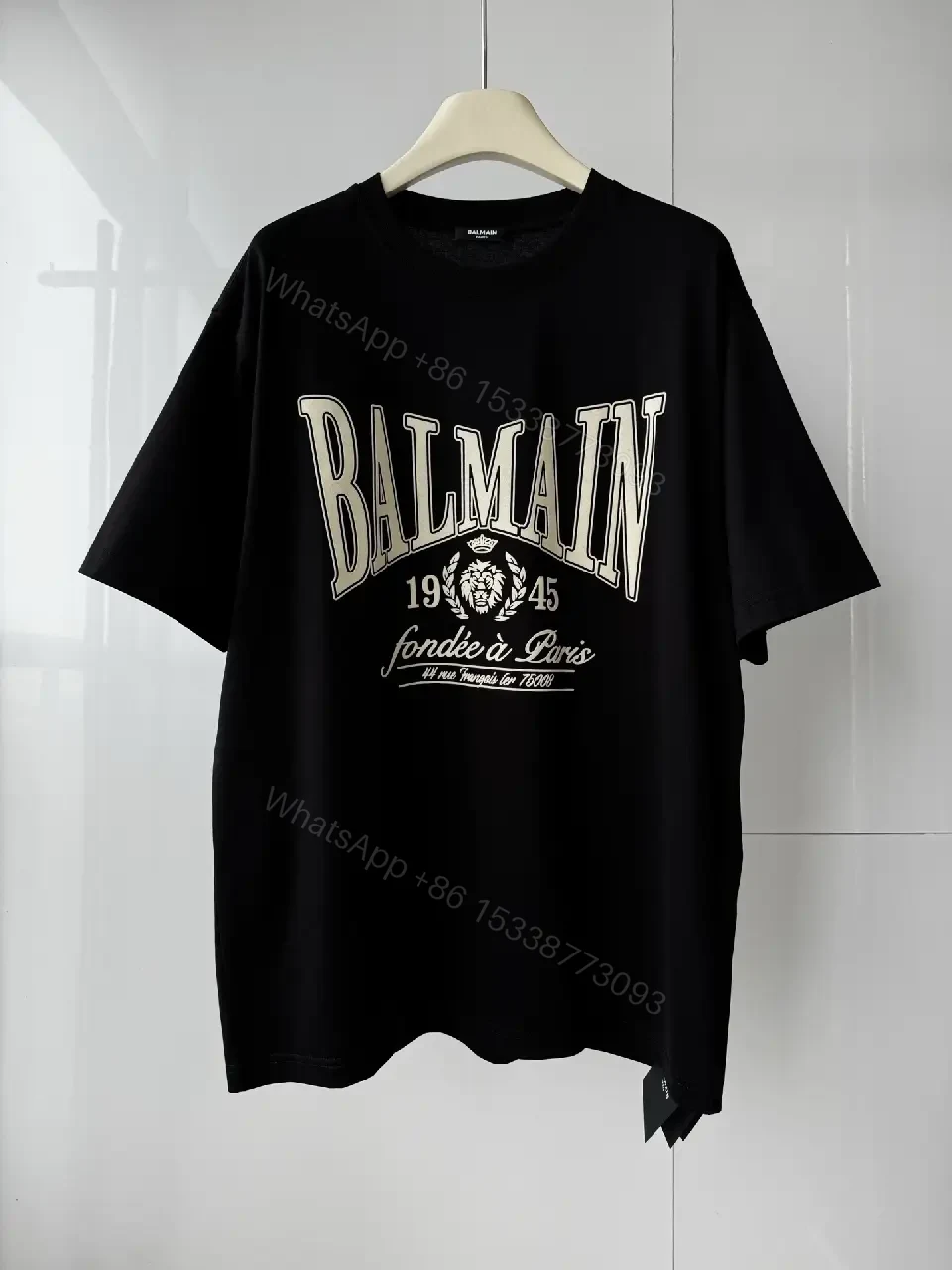 View 10 of Bold Crest Graphic Tee - Elevated Streetwear Essential