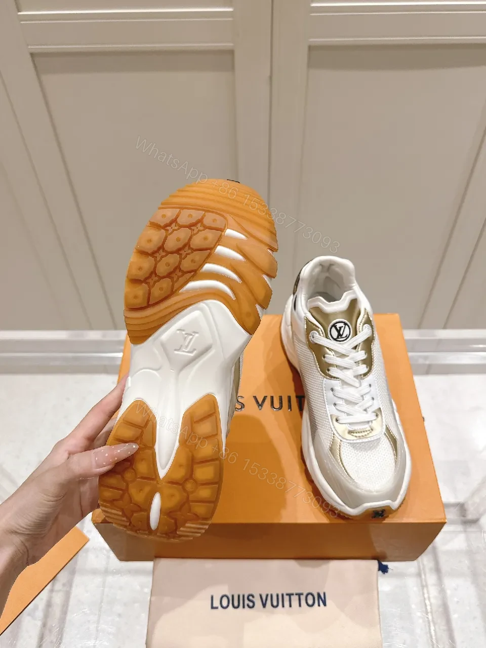 View 6 of Chunky White & Gold Luxe High-Tops: Signature LV Motif Sneakers