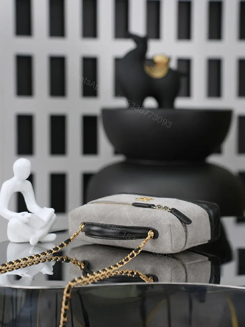 View 2 of Suede-like Gray Mini Handbag with Gold Accent