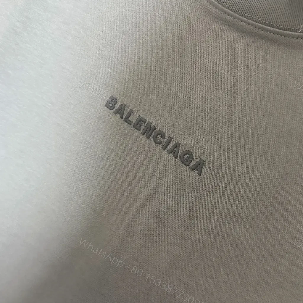 View 5 of Mint Green Minimalist Tee: Soft-Cotton, Refined Logo, Everyday Luxury