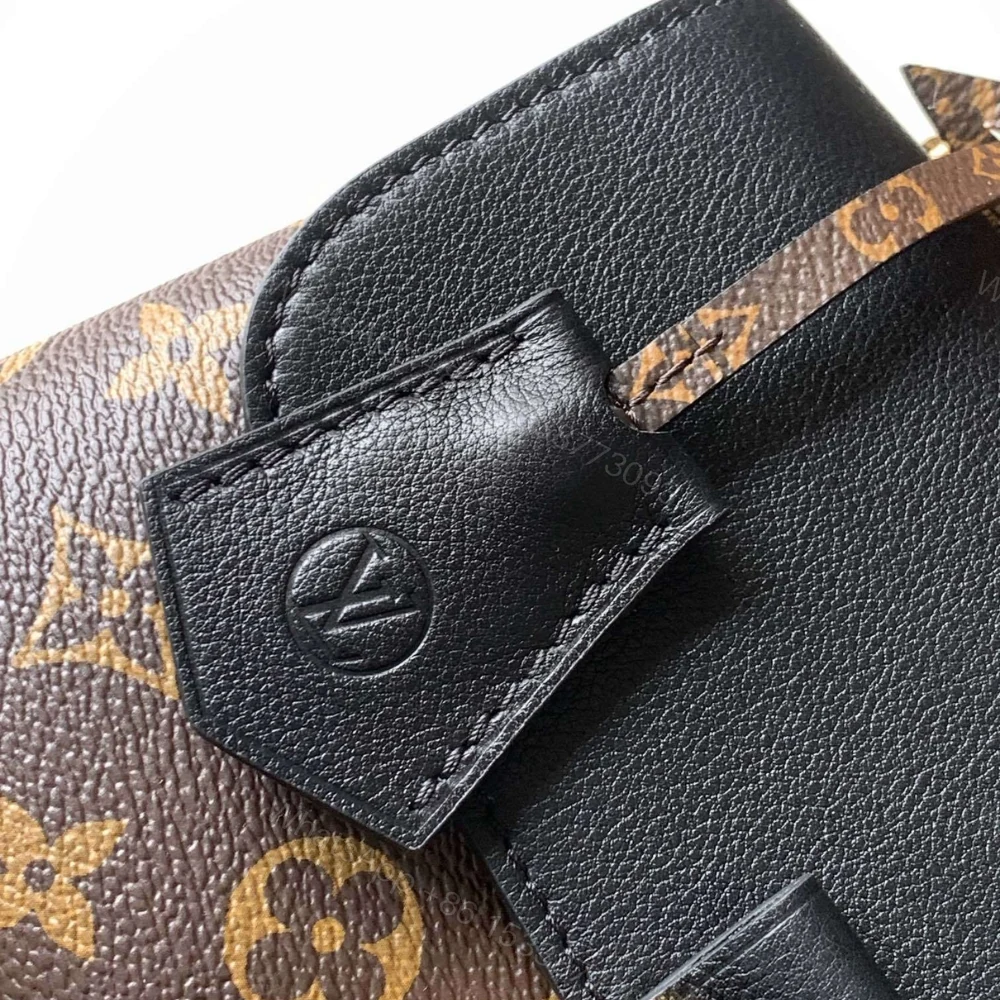 View 7 of Louis Vuitton Madeleine BB Monogram Black 24Cm M27511