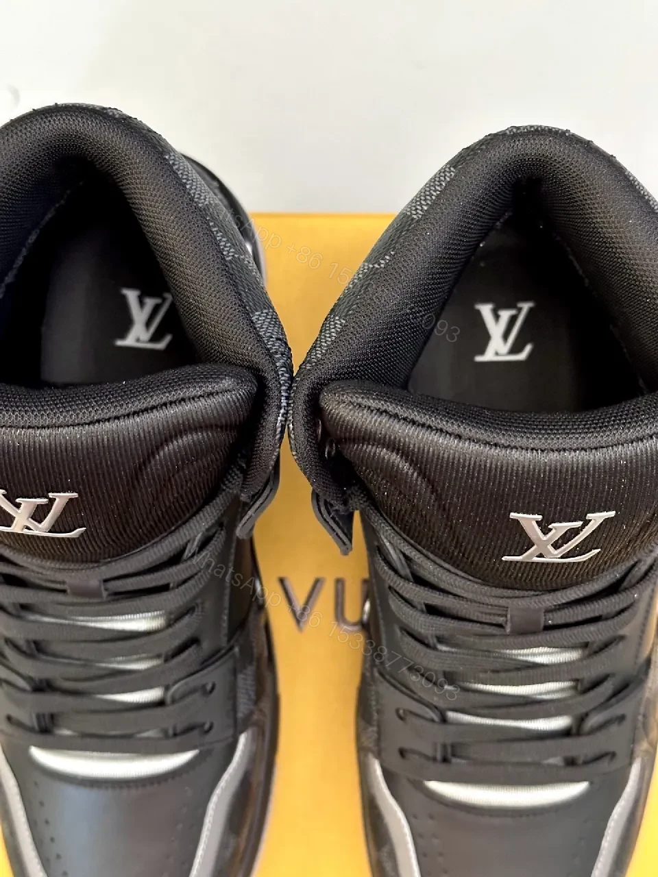 View 3 of Black Leather High-Top Sneaker: Structured, Modern Comfort