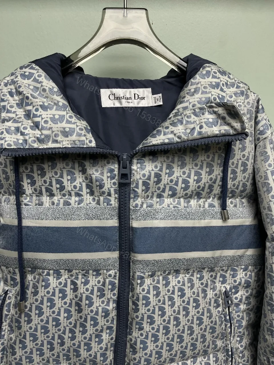 View 5 of Monochrome Puffer Jacket: Monogram Texture, Modern Warmth, Street-Ready Outerwear