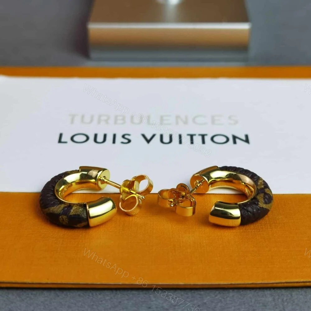 View 5 of Louis Vuitton Wild Mini Hoop Earrings M00474