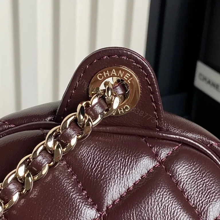 View 9 of Chic Burgundy Quilted Crossbody: Luxury Everyday Bag