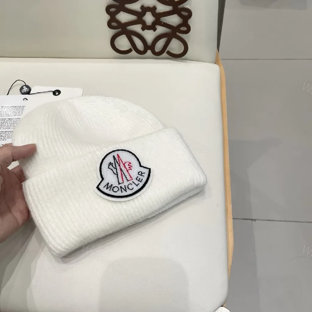 View 4 of White Knit Beanie: Ribbed Luxury, Crest Patch, All-Season
