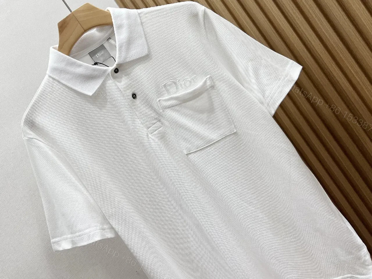 View 10 of Minimalist White Cotton Polo with Subtle Detailing