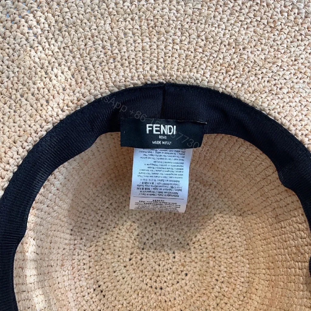 View 4 of Wide-Brim Straw Knit Hat: Bold Couture-Ready Sun Shield