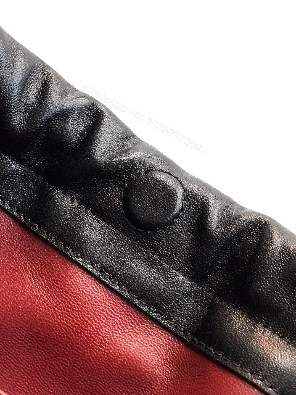 View 2 of Quilted Drawstring Bag - Black Leather-Feel, Gold Accent