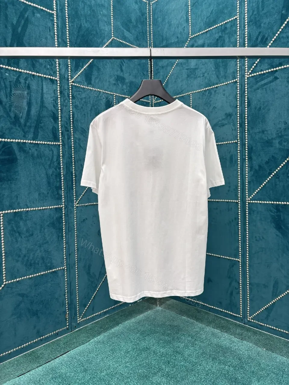 View 9 of Casual Luxury Graphic Tee: Subtle Floral, Cotton Blend, Relaxed Fit