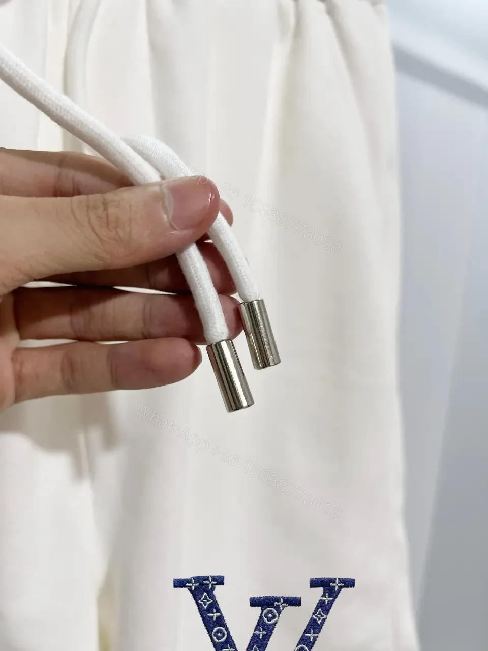 View 7 of Minimalist Luxe Sweatshorts: Premium Relaxed Fit, LV Accent Shorts