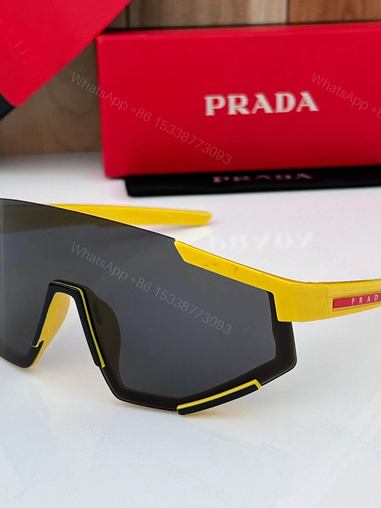 View 2 of Prada Sport Sunglasses Grey Yellow Plastic
