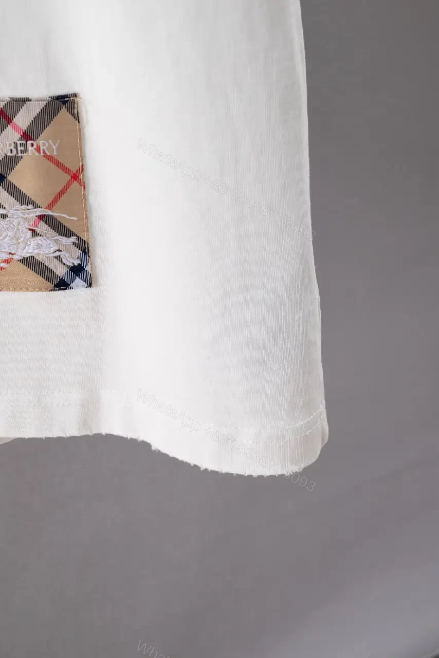 View 9 of White Embroidered Logo Oversized Tee Patch Hemfront Shirt