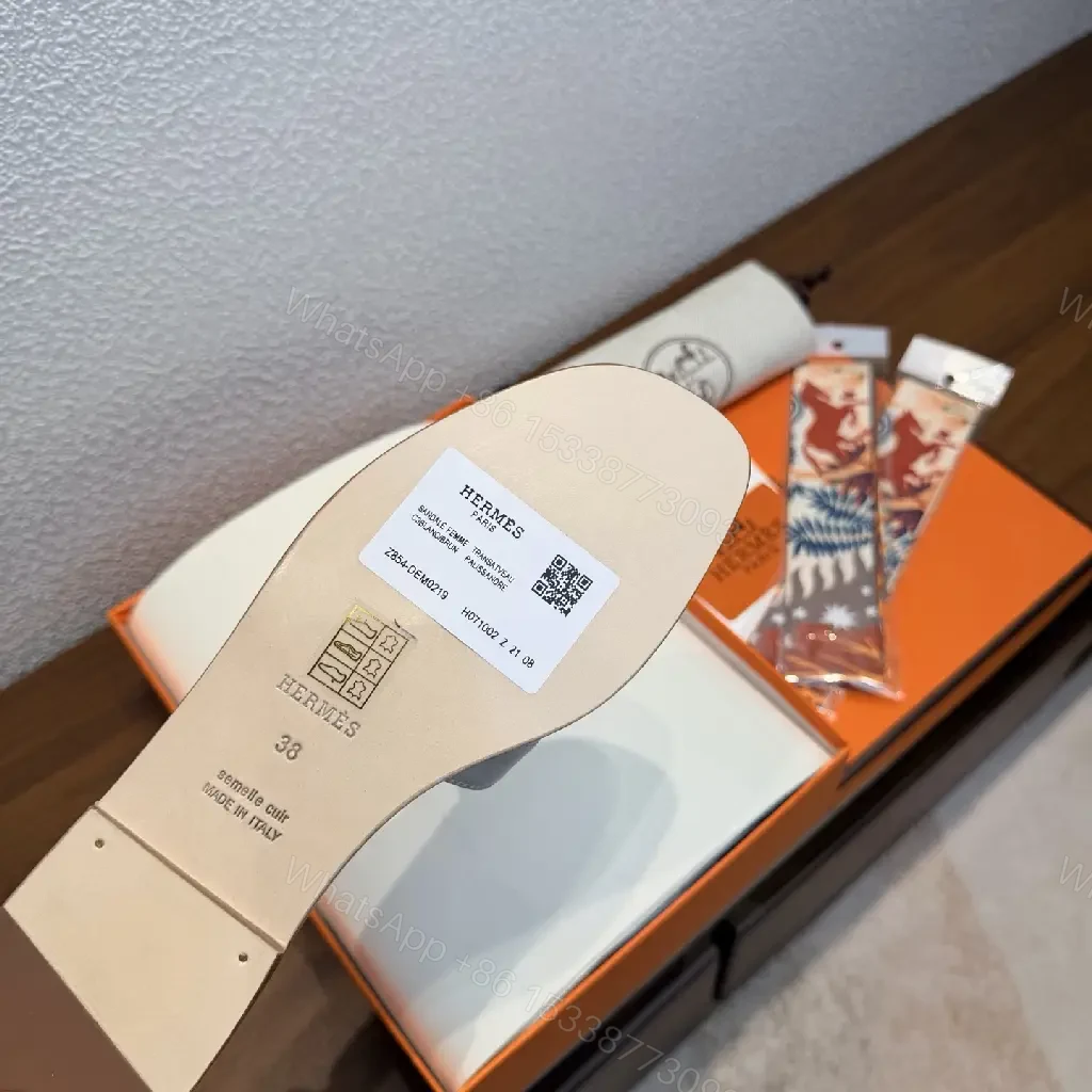 View 7 of White Leather Hermès Sandals with Cross Straps Slide Sandals Preview Set
