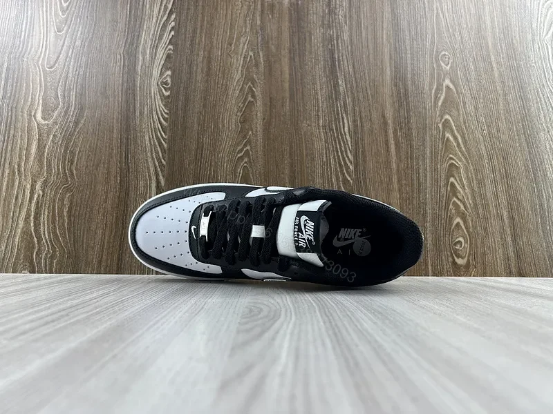 View 7 of Black Leather Low-Top Sneakers with Signature Swoosh