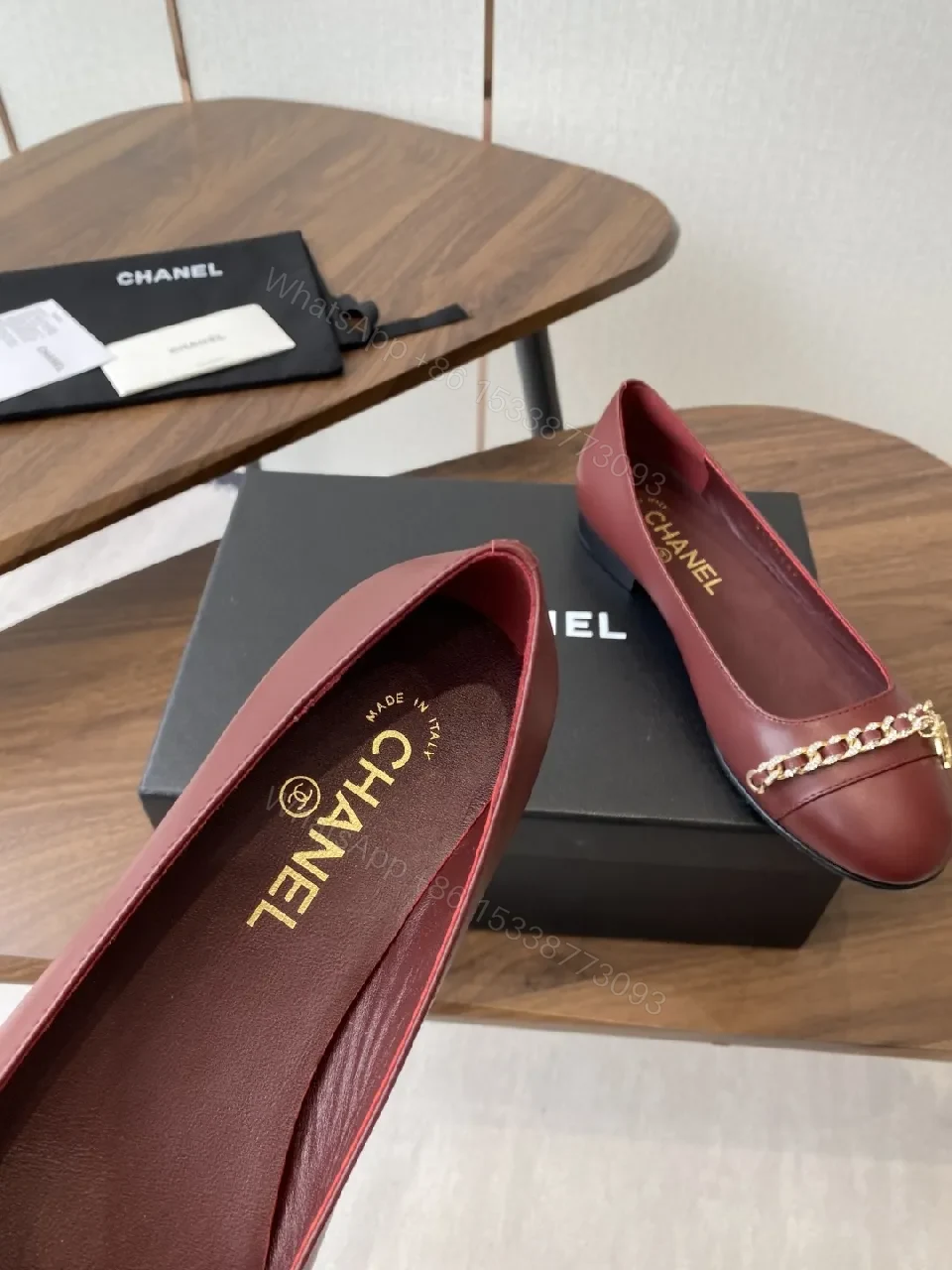 View 2 of Burgundy Leather Flats with Gold Chain Detail - Everyday Luxury