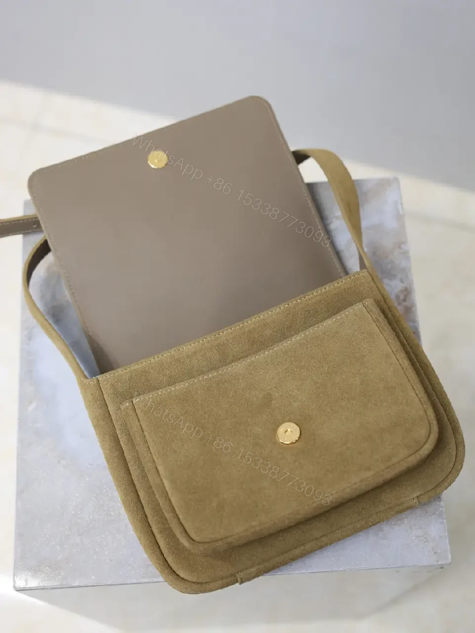 View 8 of Timeless Suede Crossbody with Gold Emblem, Compact Luxury