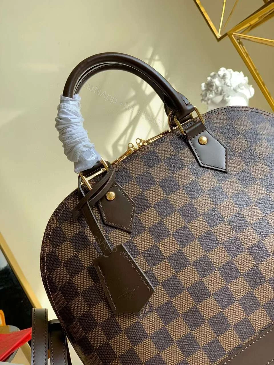 View 4 of Louis Vuitton Damier Ebene Alma PM Caro Pattern Handbags 32mm