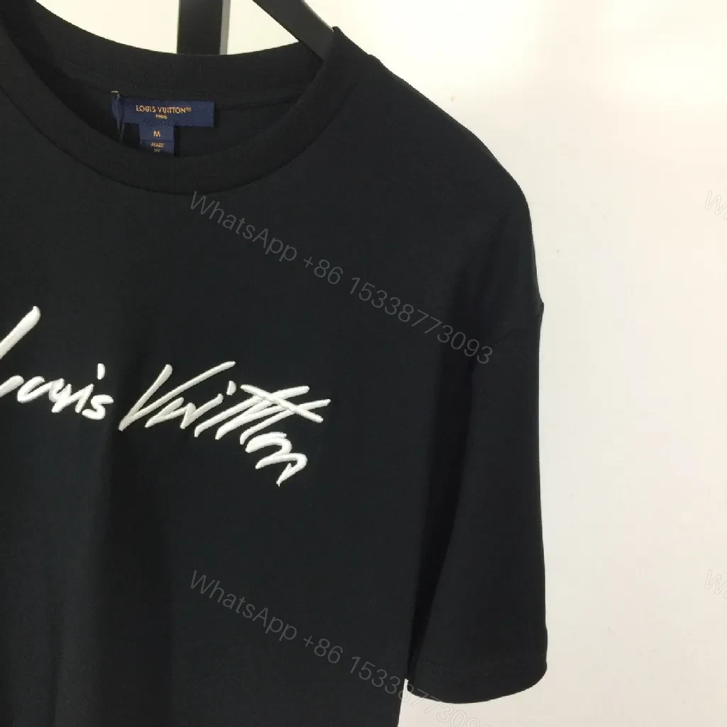View 5 of Black Cotton Tee | Graphic Luxe Logo, Relaxed Fit, Durable