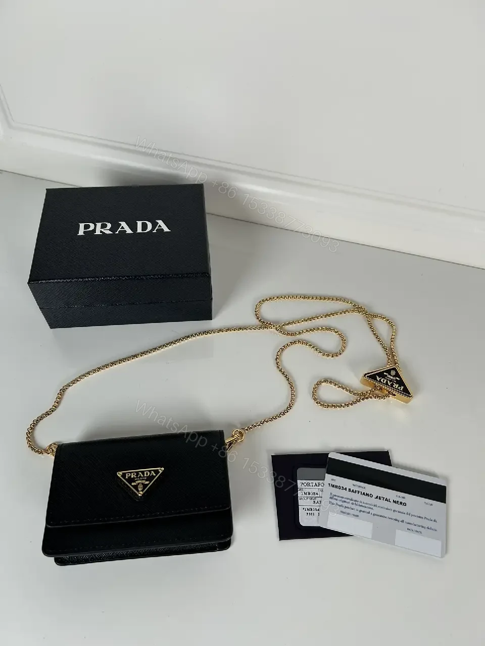 View 7 of Compact Crossbody Bag: Black Leather, Gold Chain, Minimalist Luxe