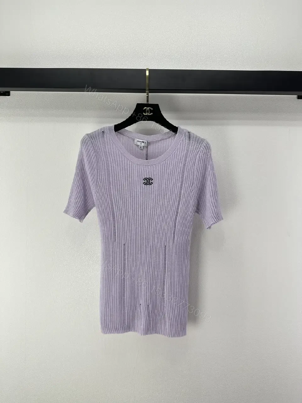 View 11 of Soft Lilac Knit Tee: Subtle Emblem, Effortless Luxury Top