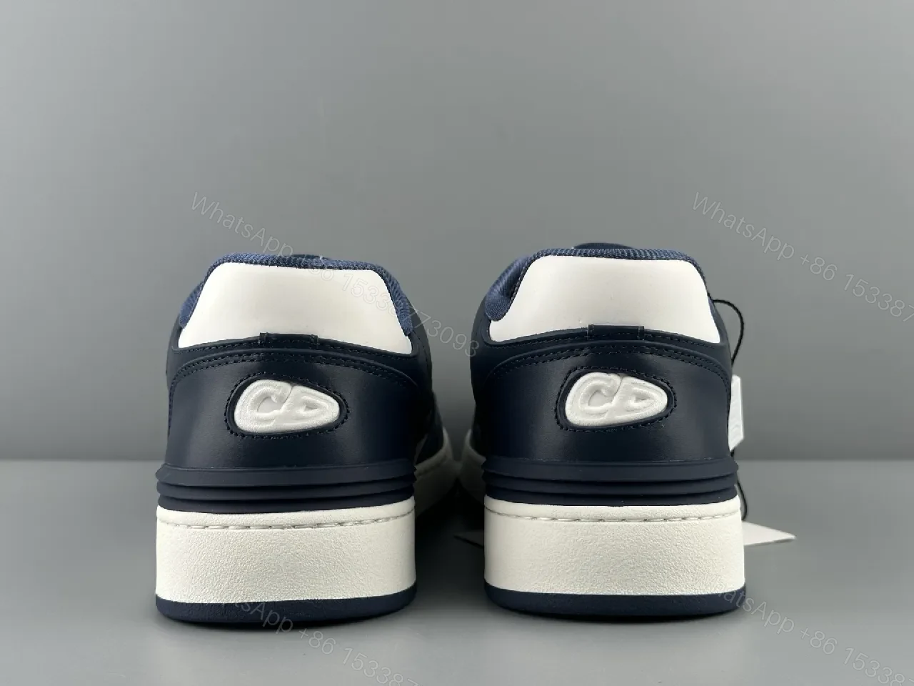 View 2 of Navy Leather High-Top Sneaker with Cutout Detailing