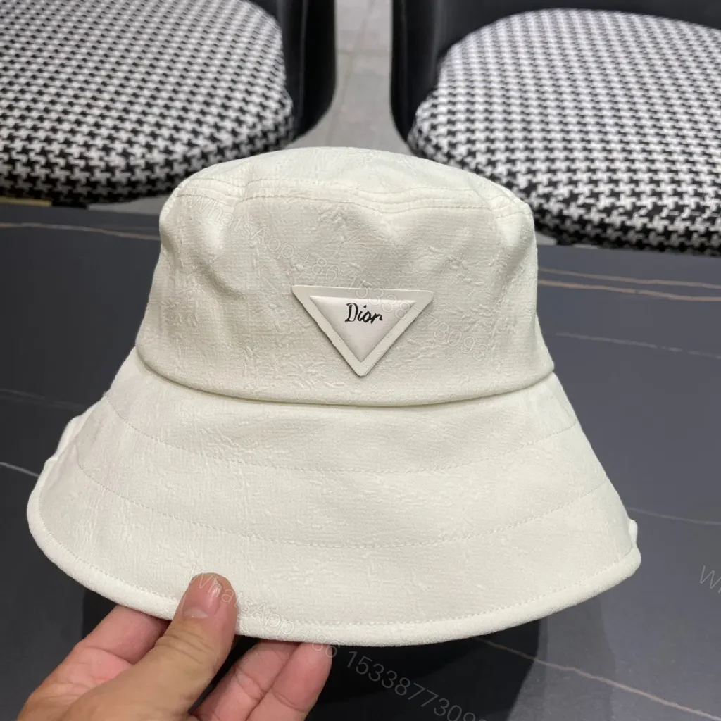 View 8 of Compact Luxury Bucket Hat with TriangleEmblem, Off-White, Textured Weave