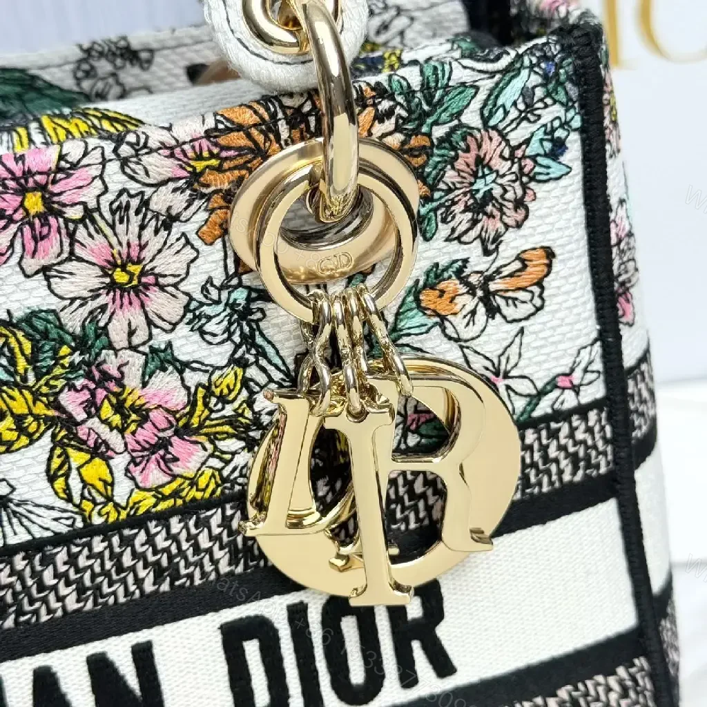 View 5 of Floral Canvas Luxe Bag with Logo Detailing Handbag