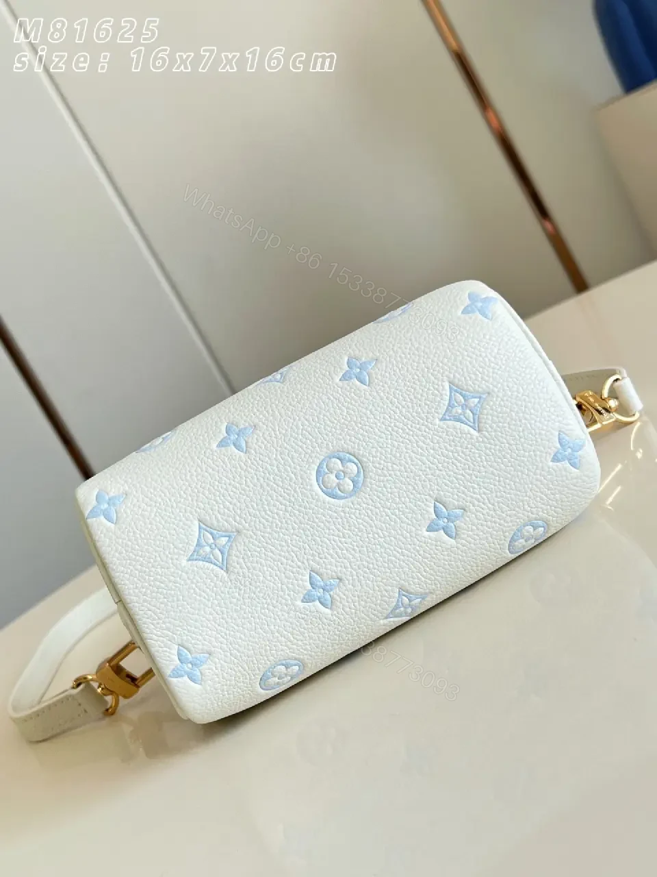 View 3 of Soft White Mini Satchel – Textured Leather, Light Blue Accents, Luxury Everyday Carry