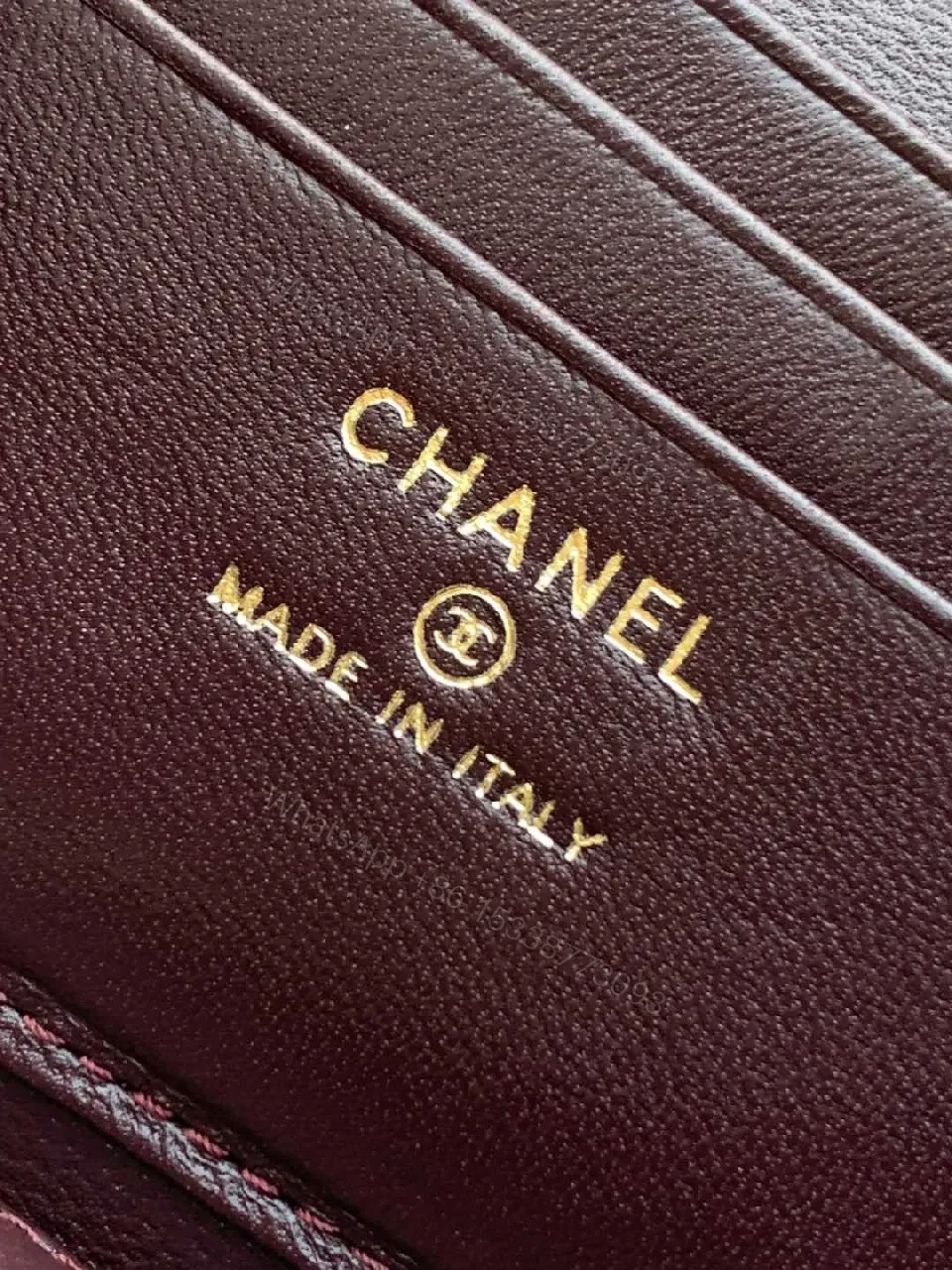 View 6 of Quilted Burgundy Bag with Gold Chain Handle—Compact Luxury