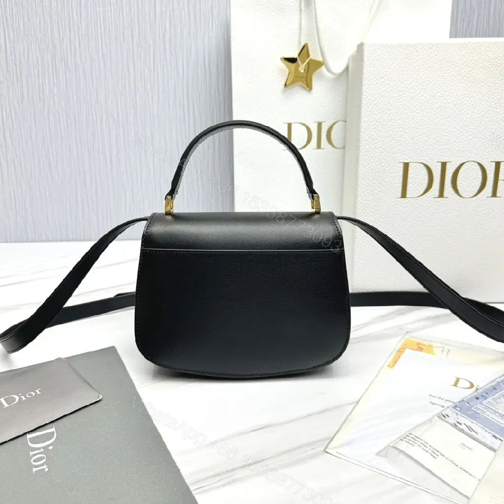 View 6 of Chic Black Leather Saddle Bag with Gold Hardware