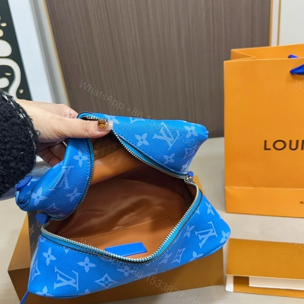 View 3 of Louis Vuitton Locker Dopp Kit Monogram Pigment Blue 23cm M28228