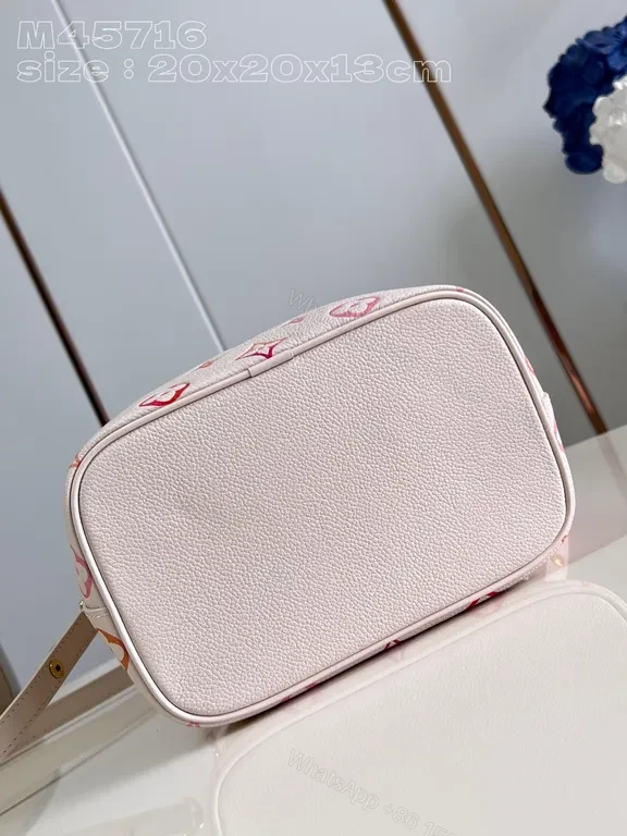View 2 of Chic Soft Pink Monogram Drawstring Bucket Bag - Luxury Style