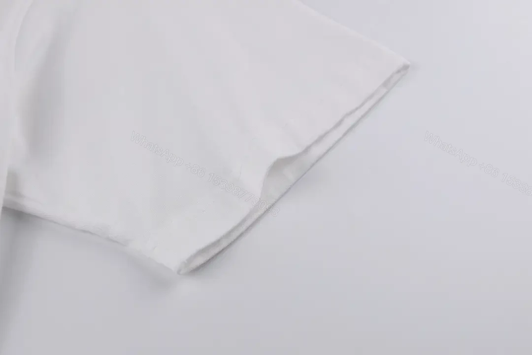 View 7 of Minimalist White Tee with Subtle Burberry Collar Detail