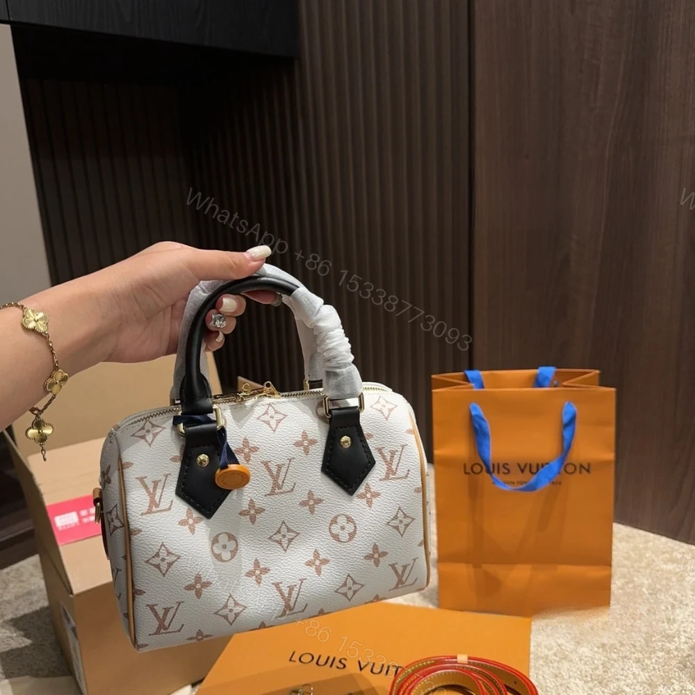 View 2 of Louis Vuitton Speedy Bandoulière 20 Monogram Dune Coated Canvas 20Cm M46906