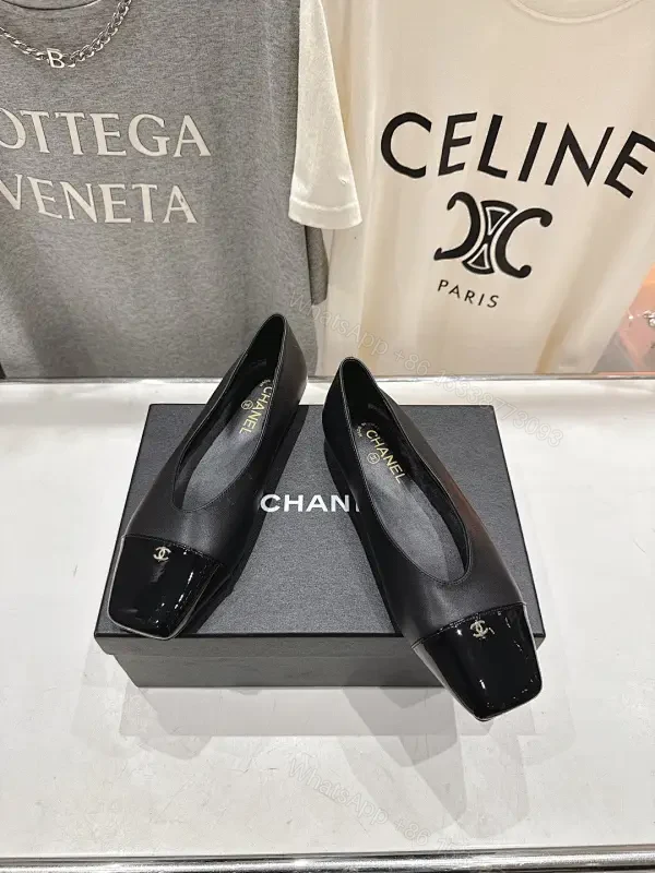 Chic Black Leather Slip-Ons with Quilted Toe Comfort Flats — view 1