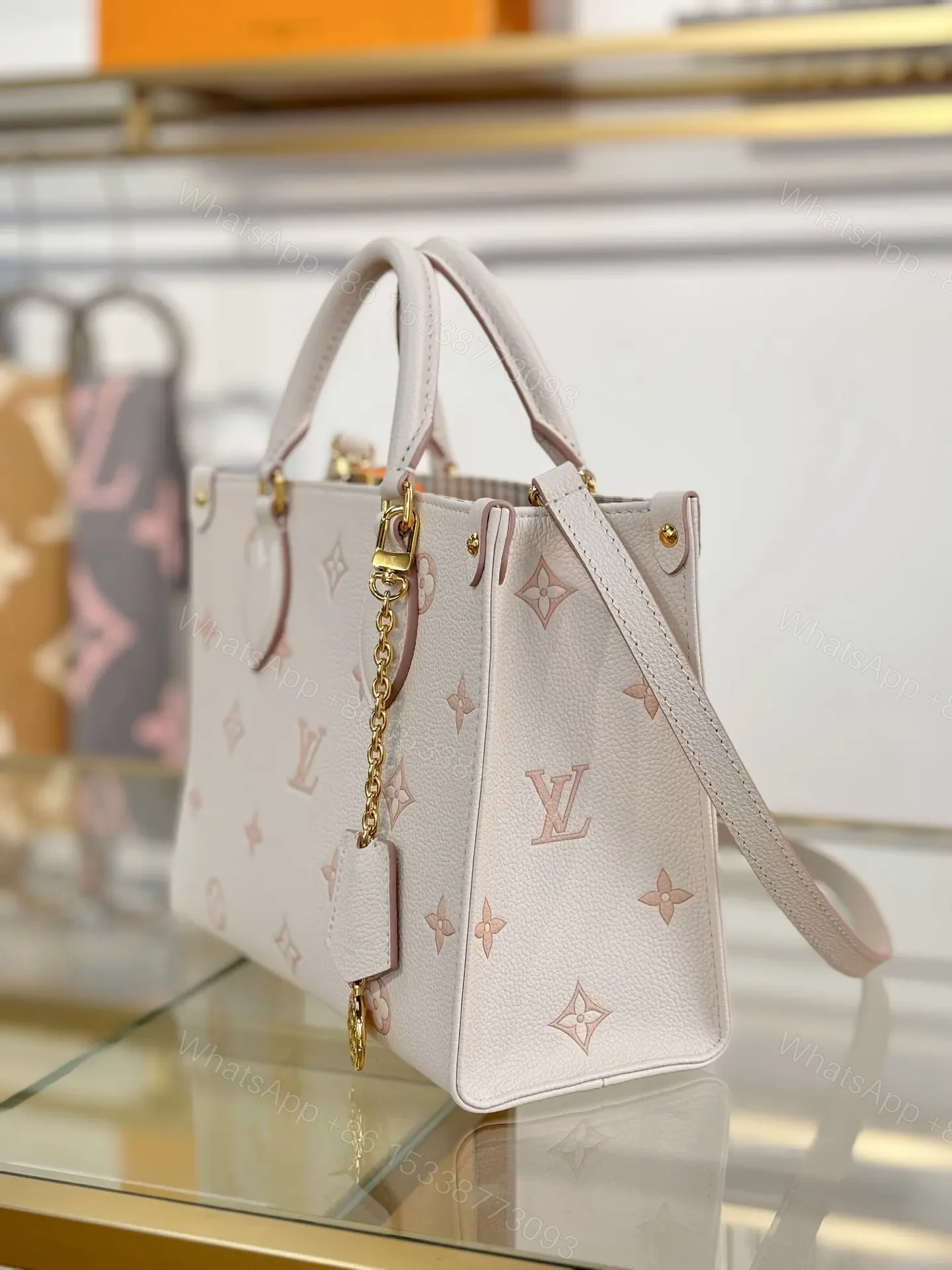 View 5 of Louis Vuitton OnTheGo Mini bag (M14403) in white Monogram Empreinte