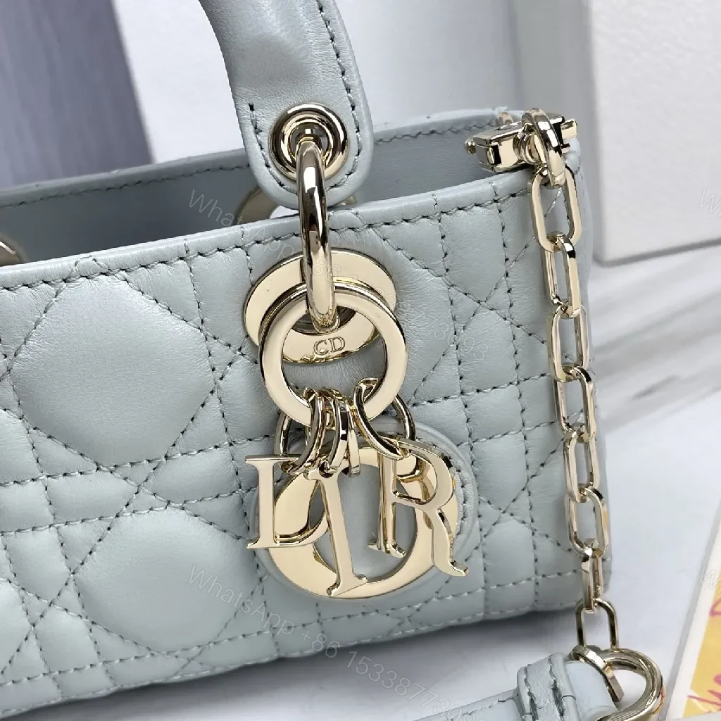 View 5 of Soft-Texture Quilted Mini Bag with Gold Charms, Calfskin, Elegant Chic, Luxury Carryall