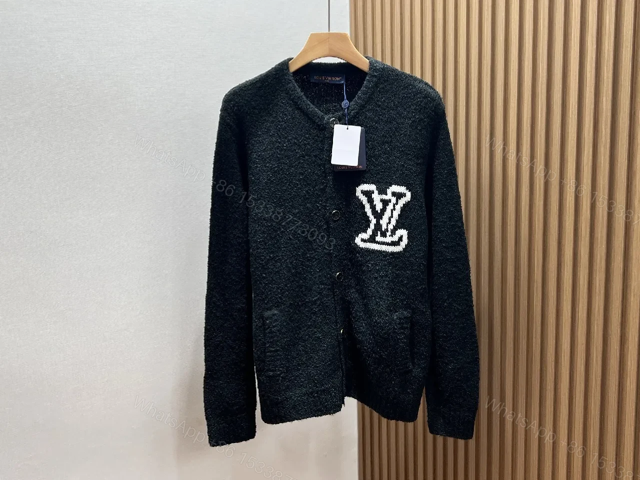 Black Boucle Cardigan | Luxe Texture + Signature Logo + Cozy Warmth — view 1