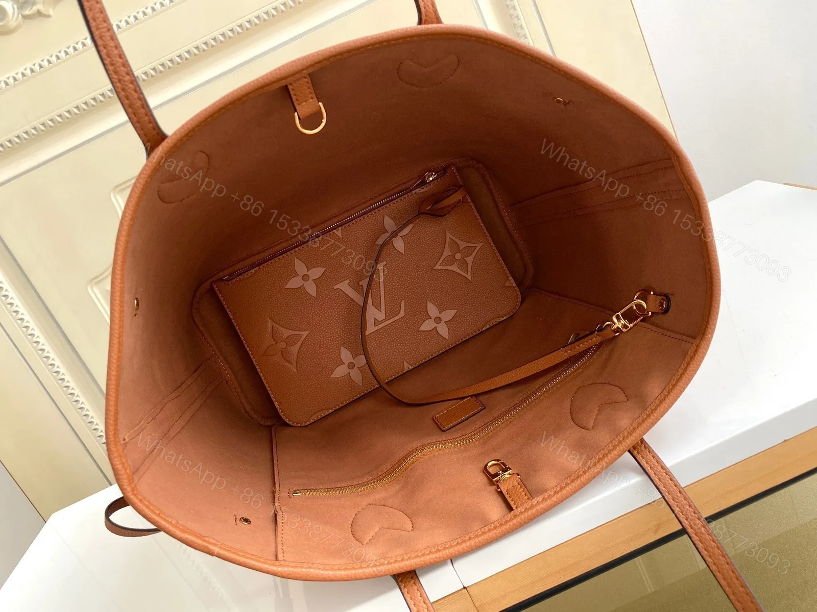 View 7 of LV NEVERFULL MM 32 BROWN MONOGRAM EMPREINTE LEATHER